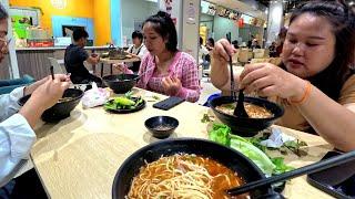 Visiting Vientiane Center in Laos with the ladies, eating noodles at the food court