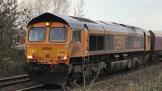 66785 powers past Attenborough crossing with 6M81 Immingham - Ratcliffe coal train on 24th Feb 2021