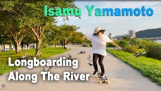 Isamu Yamamoto: Longboarding along the river