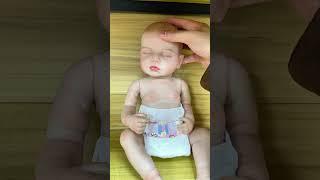 Do you like this pink realistic baby doll? 