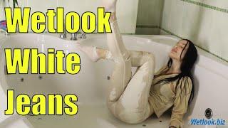 Wetlook girl in white jeans | Wetlook girl soaks her clothes in the jacuzzi | Wet look Hair