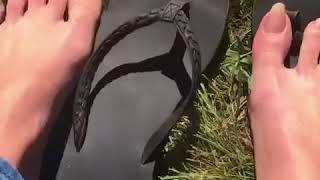 Natural long toenails in flip-flops