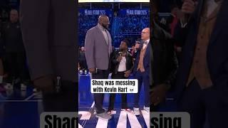 Shaq towering over Kevin Hart 