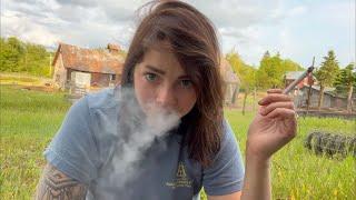 Woman Smoking Cigarettes and Hanging Out at a Farm  