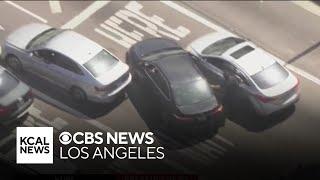 Alleged reckless driver sideswipes two cars during LAPD pursuit