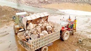 Have machine caterpillar well lodar 966E big rocks lodad trolleys and dangerous travel#video#for you