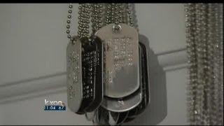 Vets make dog tags for fallen comrades