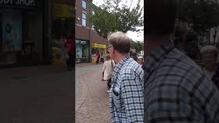 Singing, busking performance Macclesfield town