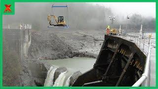 Extremely Dangerous Dam Removal By Excavator. Heavy Equipment Attach Wrecking Ball To Destroy Dam