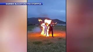 BURNING LOVE! Newlyweds celebrate big day with fiery stunt