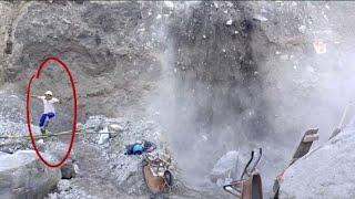 THE STRUGGLE TO BRING DOWN SOLID CHUNKS OF SAND RESULTED IN A LARGE LANDSLIDE