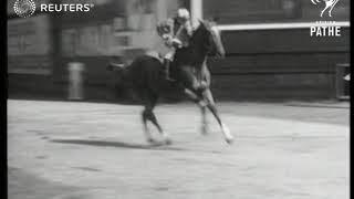 ATHLETICS: Sprinter Jesse Owens wins race against a horse (1937)