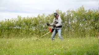 Corte de pasto con desbrozadora Husqvarna 355rx