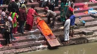 CREMATION CEREMONIES AT PASHUPATINATH TEMPLE KATHMANDU NEPAL//GARY TRESIZE VIDEOGRAPHY//