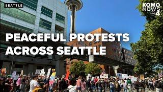 Seattle police help facilitate a peaceful No Kings protest as 70K+ people march through city
