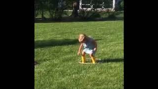 Little girl tries hula hoop...sooo sweeet :)