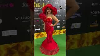 Rakhi Sawant dolls up in red gown at green carpet of IIFA 2023