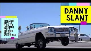 LOWRIDERS - Danny Slant takes a  bicycle ride through the Low Rider party Redondo Beach California