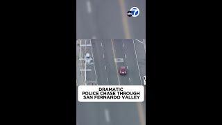 Wow! Prius driver smashes through gate during police chase