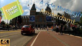 A Bike Ride Through the Beautiful City of AMSTERDAM! 4K@60 TOSTIETOURS!