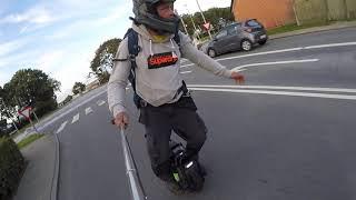 Onewheler defeds motorbike. Fastest Wolt courier Future-man