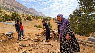 Nomadic life: building a nomadic house: cutting firewood in the nomadic way