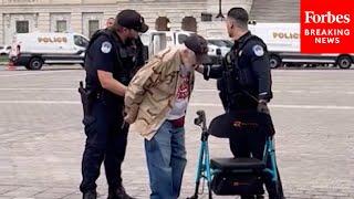 WATCH: Footage Shows Police Arresting Elderly Protester In D.C. Ahead of Trump's Military Parade