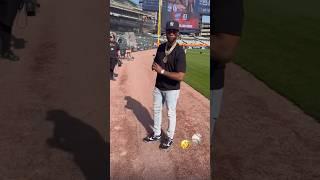 Papoose showing Claressa shields how to pitch