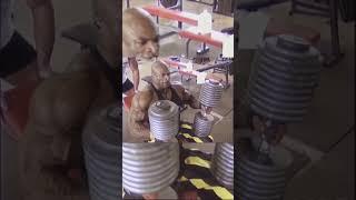 ronnie coleman (100kg on each arm)