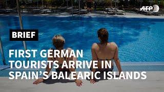 First German tourists arrive in Spain's Mallorca island in post-COVID test | AFP