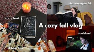 a cozy fall vlog  reading a witchy book, decorating for fall, book haul