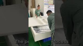 The packaging process of a new 75" Customized Touch Mirror TV - Smart Mirror. TV in Mirror