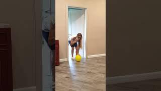 A little doggie takes a yellow balloon from Tanya