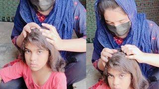 Villager  girl aniza's hair checking by api