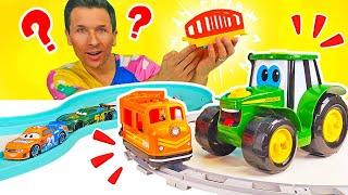 Construisons une route pour voitures et une voie ferrée avec Johnny le tracteur. Jeux pour enfants