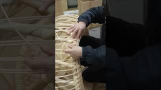 Stages of manufacturing a Japanese rattan chair by a Japanese craftsman.