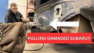 Pulling damaged Subaru collision repair!