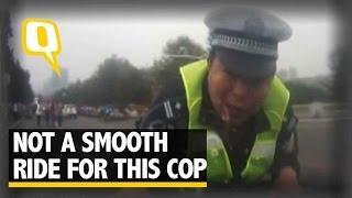 The Quint: Shocker Alert: Cop Dragged on Car’s Bonnet Unharmed