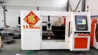 fiber laser cutting machine with exchange table and protective cover used At customer's factory