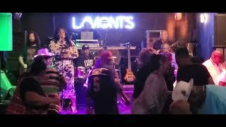 The Spotlight Band sings "Before I Let Go" at Lamont's Entertainment Complex.