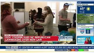 Roy Cooper & Voting rights activists sue over new North Carolina elections law