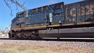 Empty coal train heads up North as the lead engine notches it up in full throttle