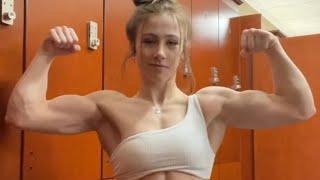 Beautiful muscle girl flexing