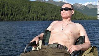 Putin sunbathes on vacation