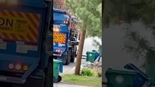 Garbage truck drops bin