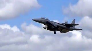 McDonnell Douglas F-15E Strike Eagles & Lockheed Martin F-22A Raptors landing with comms.