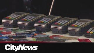 11 people arrested and over 100 charges laid in taxi scam costing victims over $500K