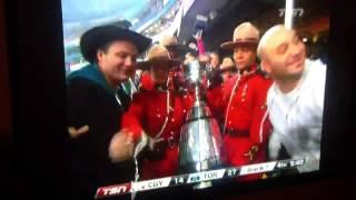 Guy tries touching grey cup and gets owned by RCMP