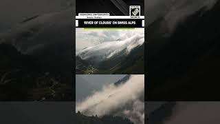'River of clouds' descend on Swiss Alps in weather event
