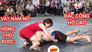 Men's and women's wrestling or the Van Mon Xa Man village festival in Bac Ninh.